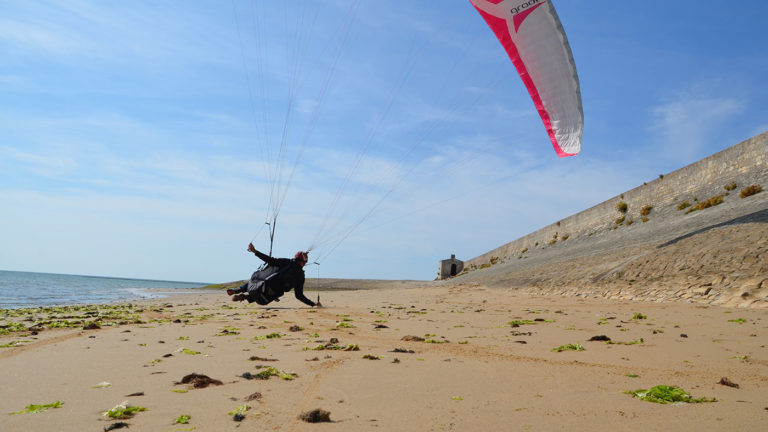 Paragliding at sand level